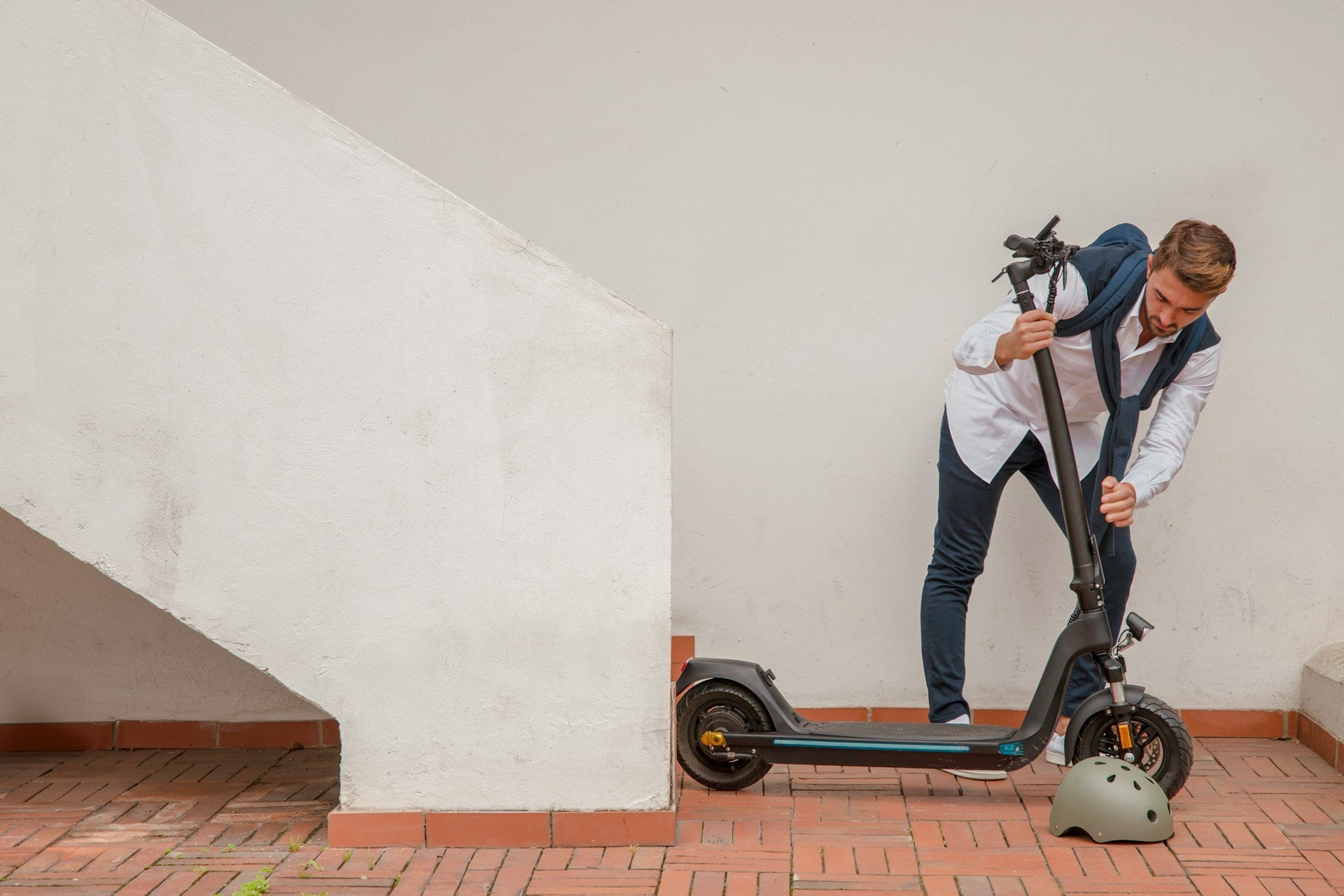 man about to ride the e-scooter