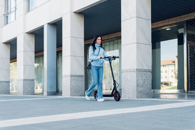 How much does an electric scooter cost – a woman riding on her scooter