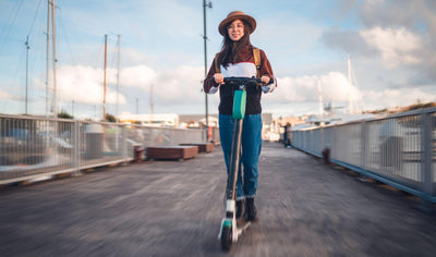 riding electric scooter