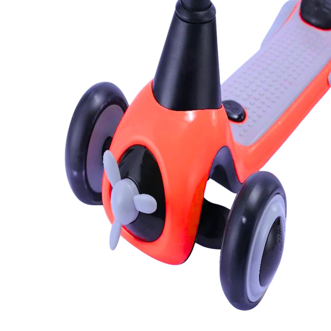 Close-up of a red children's e-scooter with black wheels on a white background
