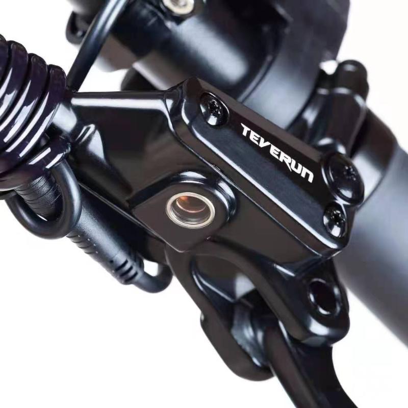 Close-up of a Teverun Fighter 11  black brake lever with 'Teverun' branding on a white background