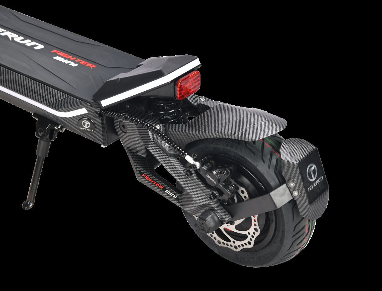 Close-up of a Teverun fighter Mini  electric scooter with visible branding on a white background
