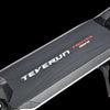Close-up of a Teverun Fighter mini product with carbon fiber texture on a black background
