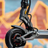 Close-up of a Teverun fighter Mini  electric scooter with a colorful graffiti background