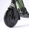Close-up of a green E Twow GT SL electric scooter wheel on a white background