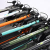 Stack of folded E Twow GT SL with different colored frames on a white background