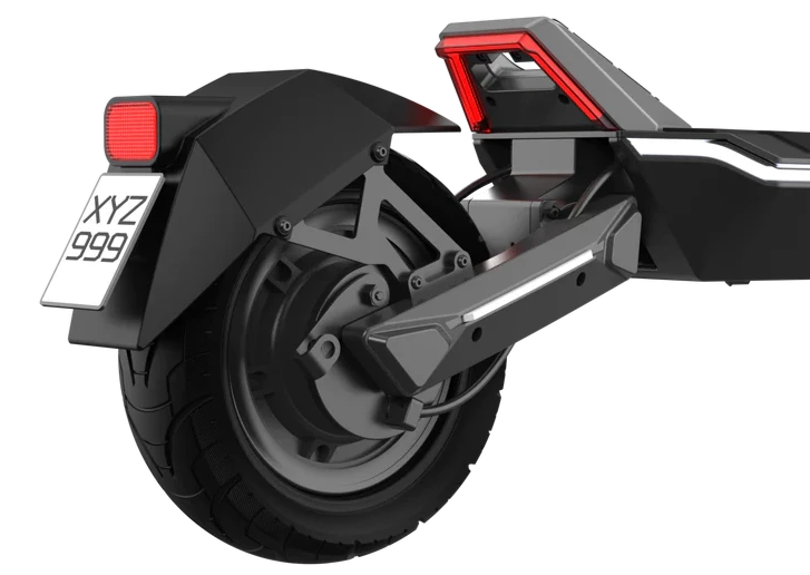 Rear wheel and suspension of the Punk rider showing the strong mudguard and puncture resistant self healing electric scooter tyre