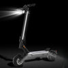 Electric scooter with headlights on a black background