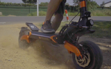 Blade GT Electric Scooter Spinning the rear tyre in the dirt