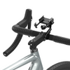 A black bicycle handlebar mount holding a smartphone holder, attached to the stem of a silver road bike with black handlebar tape, on a white background.