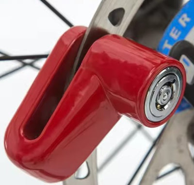 Bike disc lock with reminder rope