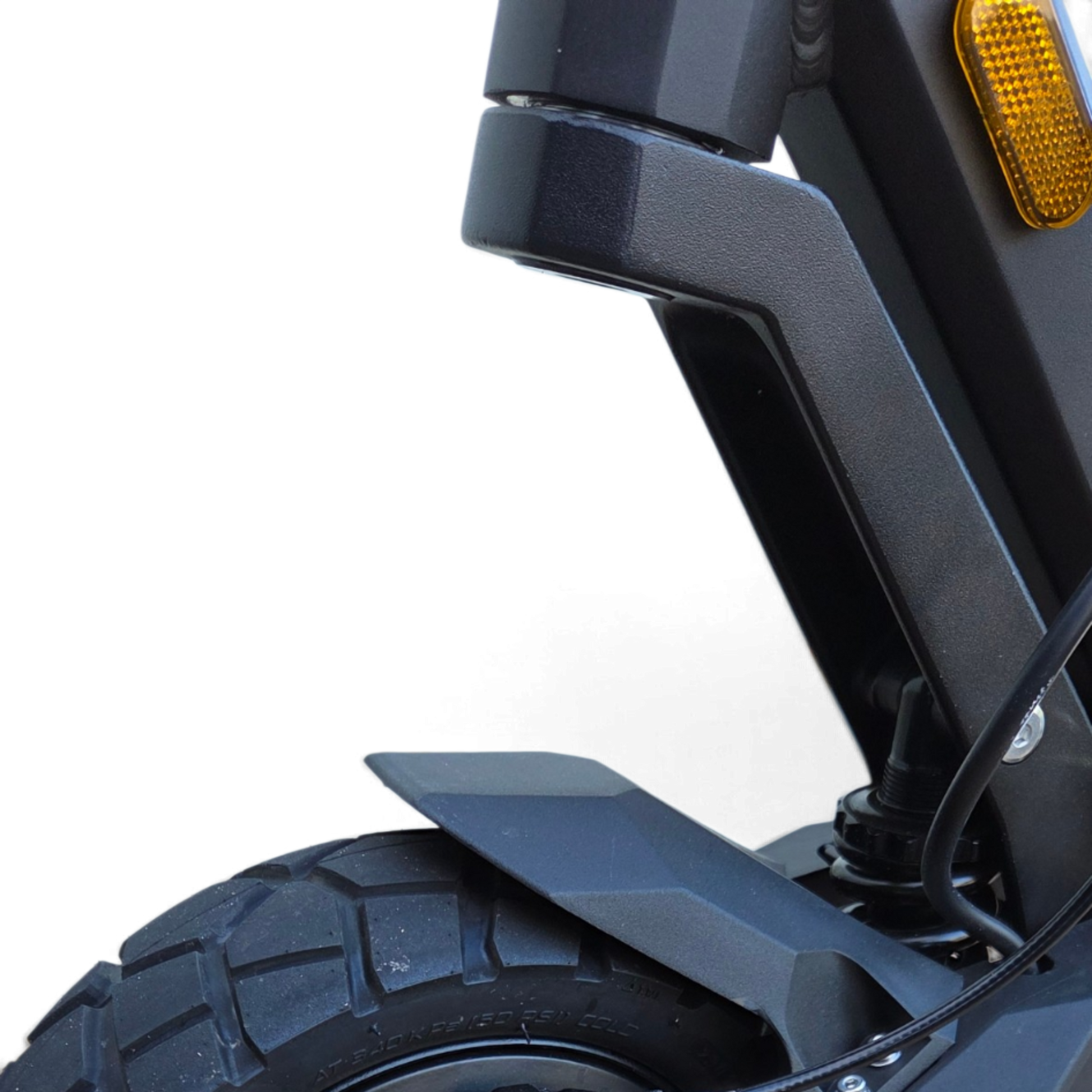 Close-up of the black coil suspension and rugged tyre on an Electric Scooter Shop Punk Roamer Pro electric scooter.