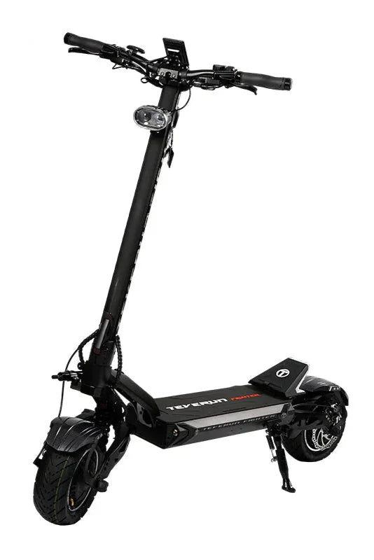 A black Teverun Fighter 11+ electric scooter with large wheels, twin-piston brakes, and a TFT screen.