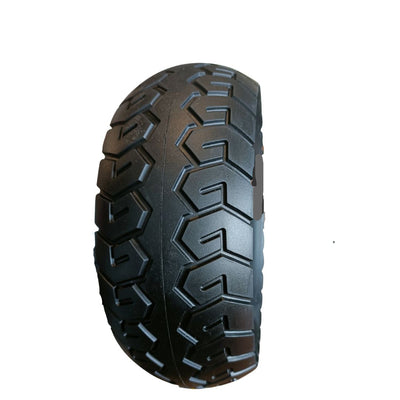 Person holding a black tire with a white background