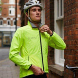 Man zipping up the proviz switch high visibility safety cycling jacket